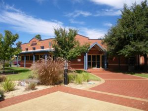 Library building with wide level paved pathway to the entrance. Picture taken in Berrigan NSW.
