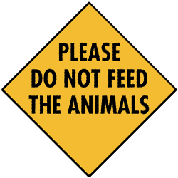 The sign says Please do not feed the animals