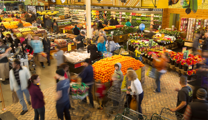 overhead picture of the fresh food section of a supermarket. 