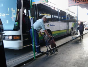 Bus driver helps woman with her wheelie walker