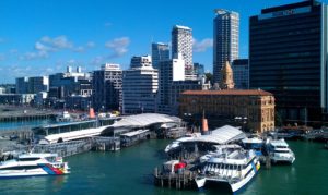 View of Auckland cityscape and waterfront with piers and boats. The Urban Design Toolkit is from New Zealand.