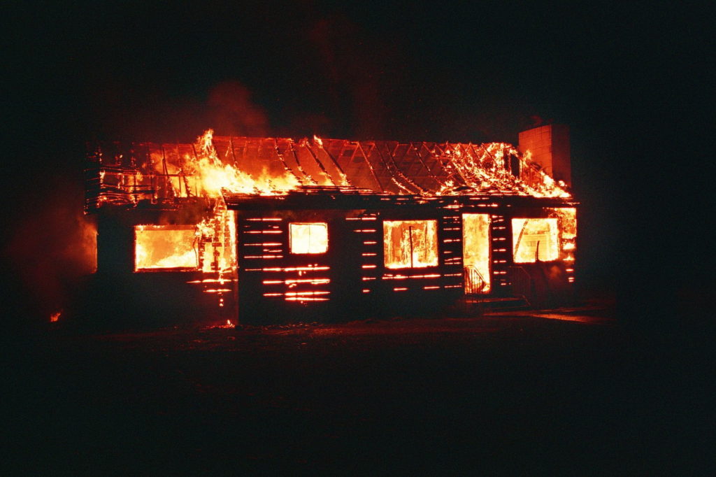 house fire photo taken at night time.