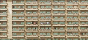 facade of an apartment building showing long balconies