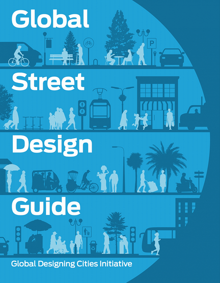 Front cover of the guide. It is blue with white text. It has outlines of pedestrians trees, buildings and transport