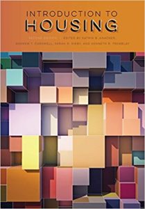 Front cover of book showing lots of different sized and coloured cubes stacked. The title banner is in dark yellow 