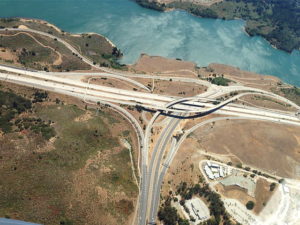 An aerial view of a new highway junction with overpasses.