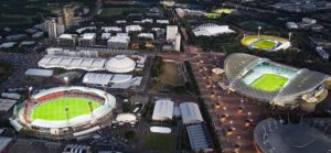 Arial view of the park at twilight that highlights the green grass of the three main stadia. Sydney Paralympic Games.