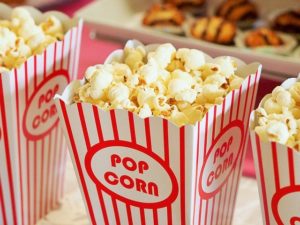 Cinema packs of popcorn. Audio describing is good for everyone.