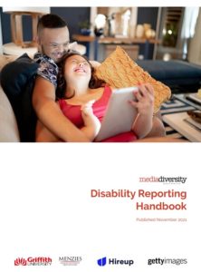 Front Cover of Disability Reporting Handbook showing a young man and woman. They are laughing together. 