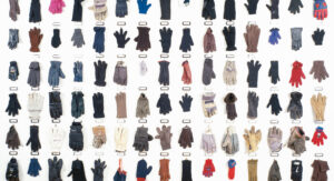 Every type and size of gloves and mittens displayed in rows. Historical context of inclusive design.