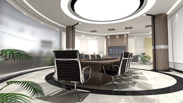 A modern office meeting room with good lighting and plants. It looks inviting.
