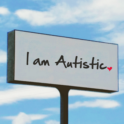 Part of the front cover of the full report with a sign saying I am Autistic. 